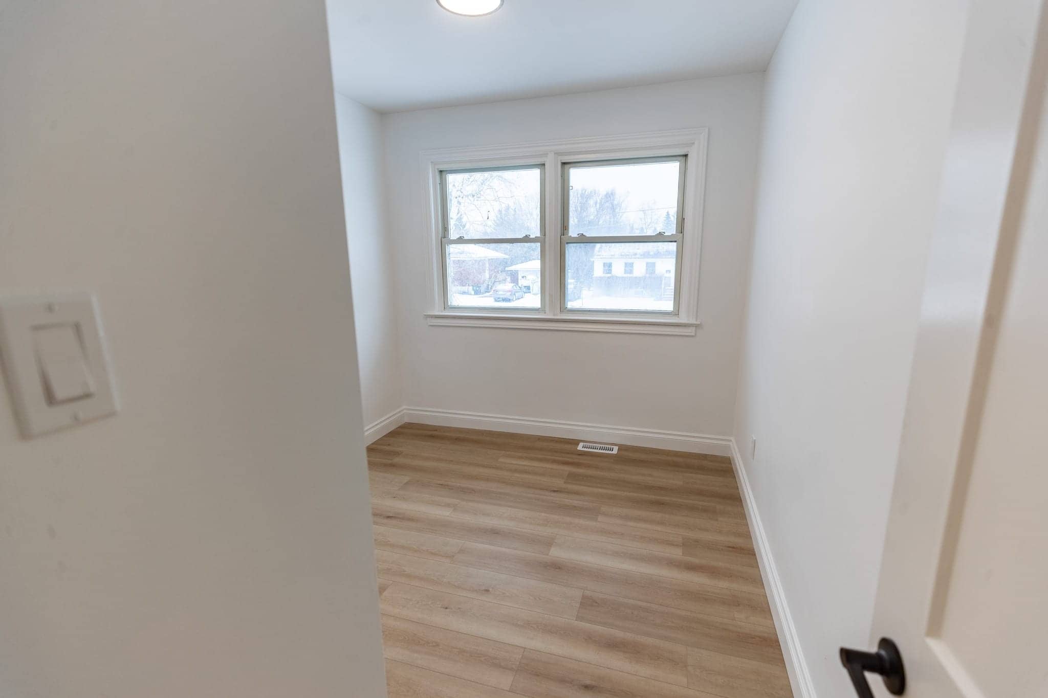 Lake Ontario waterfront bedroom — after