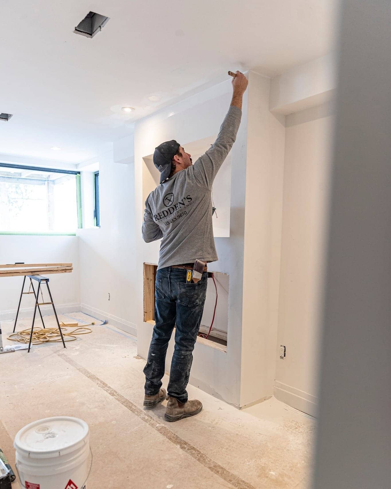 Team painting a room